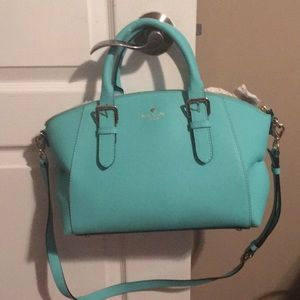 Kate Spade like new. No scratches. Gently used.